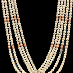 Multi-layer pearl necklace with peach accents and circular pendant design